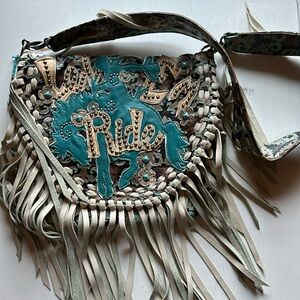 Beautiful handmade western leather purse.